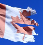 Tattered Canadian National and Quebec Provincial Flags